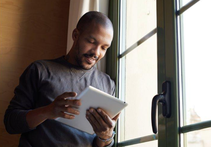 man using ipad